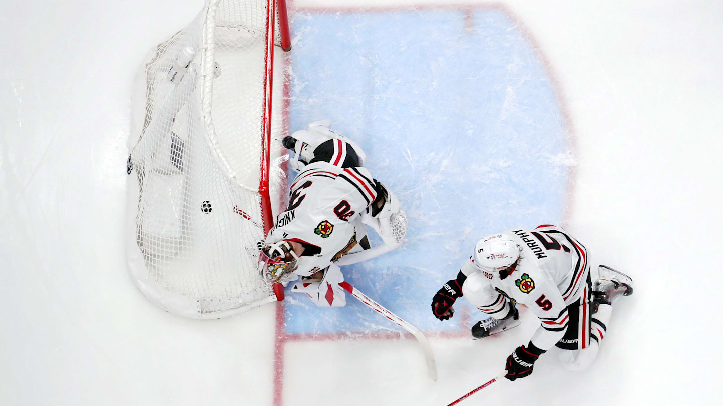 Feb 4, 2026; Columbus, Ohio, USA; The shot from Columbus Blue Jackets defenseman Danton Heinen (43) (not pictured) beats Chicago Blackhawks goalie Spencer Knight (30) for a goal during the second period at Nationwide Arena. Mandatory Credit: Russell LaBounty-Imagn Images