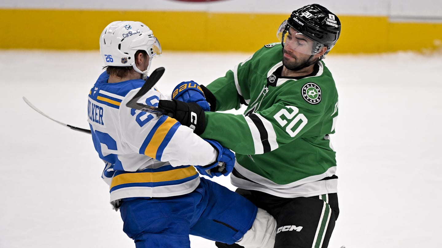 Feb 4, 2026; Dallas, Texas, USA; Dallas Stars defenseman Kyle Capobianco (20) checks St. Louis Blues left wing Nathan Walker (26) during the third period at the American Airlines Center. Mandatory Credit: Jerome Miron-Imagn Images
