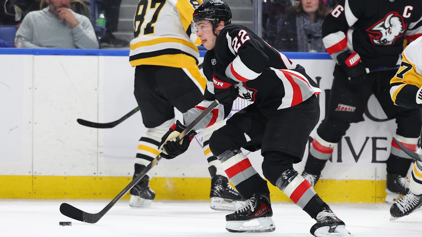 Feb 5, 2026; Buffalo, New York, USA;  Buffalo Sabres right wing Jack Quinn (22) carries the puck during the second period against the Pittsburgh Penguins at KeyBank Center. Mandatory Credit: Timothy T. Ludwig-Imagn Images