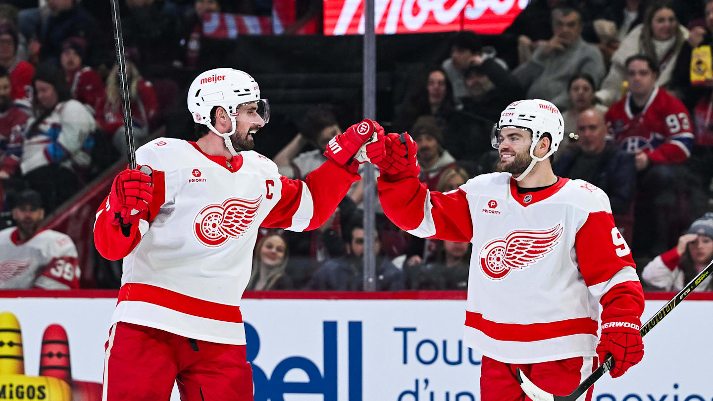 Jan 10, 2026; Montreal, Quebec, CAN; Detroit Red Wings center Dylan Larkin (71) celebrates with right wing Alex DeBrincat (93) his goal against the Montreal Canadiens during the second period at Bell Centre. Mandatory Credit: David Kirouac-Imagn Images