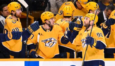 Feb 2, 2026; Nashville, Tennessee, USA;  Nashville Predators center Ryan O'Reilly (90) celebrates with his teammates after scoring a goal against the St. Louis Blues during the first period at Bridgestone Arena. Mandatory Credit: Steve Roberts-Imagn Images