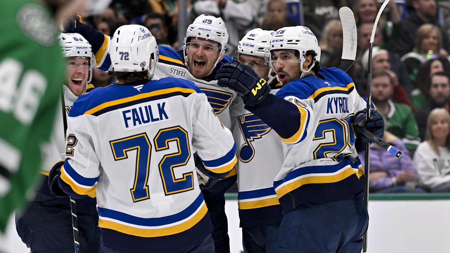 Dec 14, 2024; Dallas, Texas, USA; St. Louis Blues center Robert Thomas (18) and defenseman Justin Faulk (72) and center Jordan Kyrou (25) celebrates during the game between the Dallas Stars and the St. Louis Blues at American Airlines Center. Mandatory Credit: Jerome Miron-Imagn Images