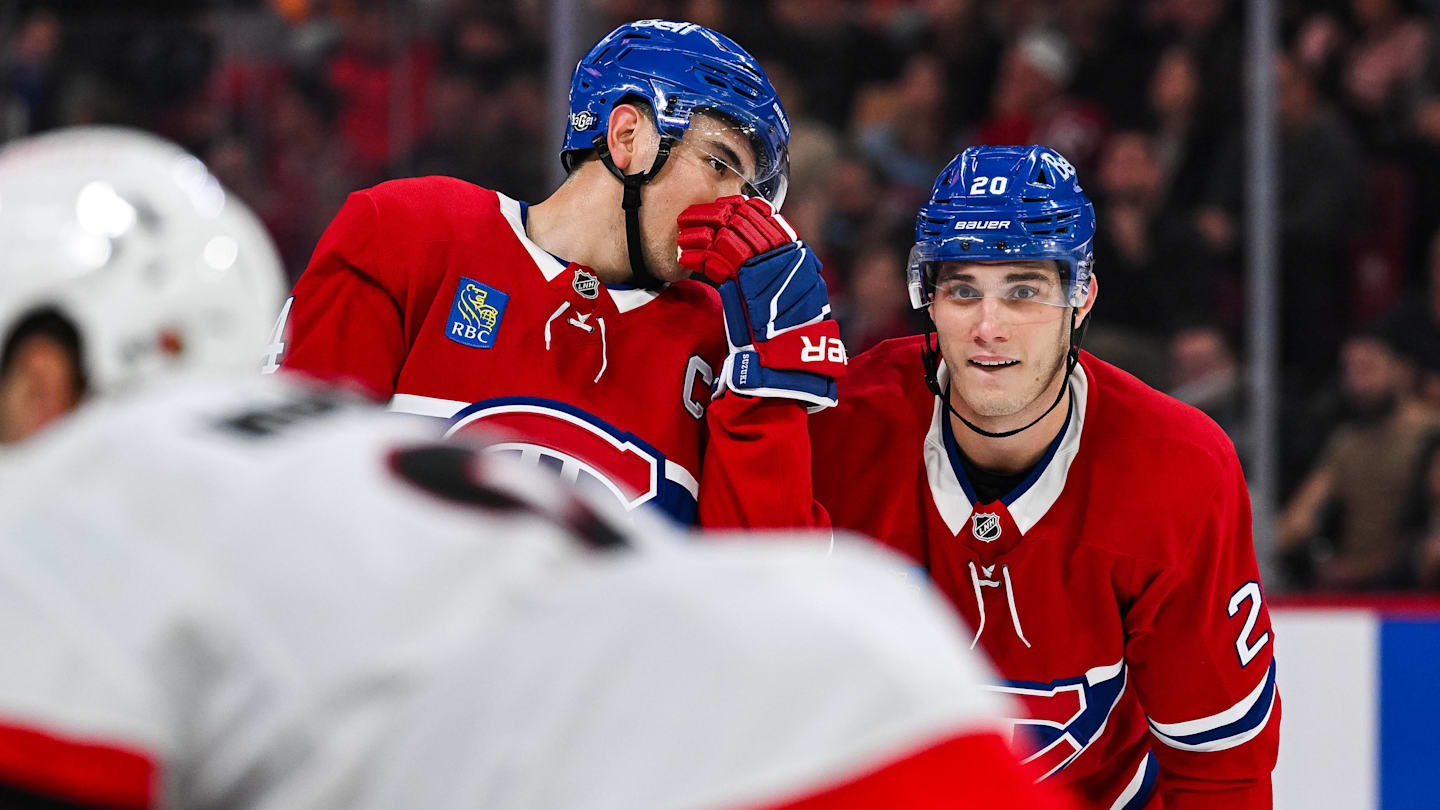 Oct 12, 2024; Montreal, Quebec, CAN; Montreal Canadiens center Nick Suzuki (14) discusses with left wing Juraj Slafkovsky (20) prior to a face-off against the Ottawa Senators during the first period at Bell Centre. Mandatory Credit: David Kirouac-Imagn Images