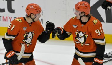 Apr 9, 2025; Anaheim, California, USA;  Anaheim Ducks left wing Cutter Gauthier (61) is congratulated by center Leo Carlsson (91) after a goal during the third period against the Calgary Flames as Honda Center. Mandatory Credit: Jayne Kamin-Oncea-Imagn Images