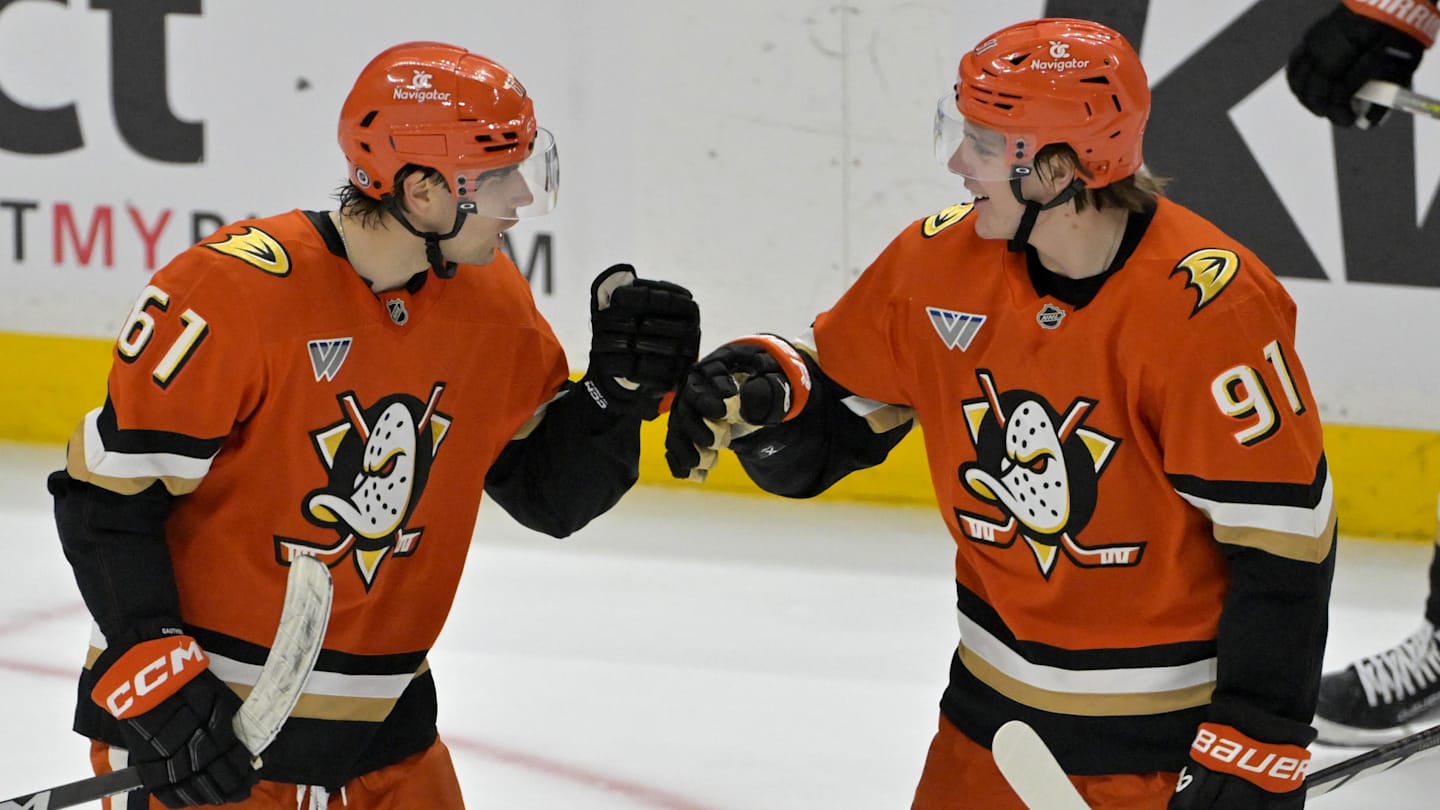 Apr 9, 2025; Anaheim, California, USA;  Anaheim Ducks left wing Cutter Gauthier (61) is congratulated by center Leo Carlsson (91) after a goal during the third period against the Calgary Flames as Honda Center. Mandatory Credit: Jayne Kamin-Oncea-Imagn Images