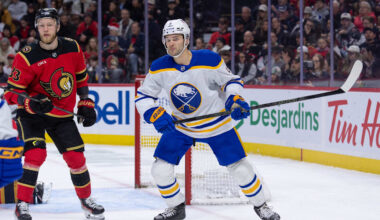 Dec 23, 2025; Ottawa, Ontario, CAN; Ottawa Senators defenseman Nikolas Matinpalo (33) and Buffalo Sabres center josh Norris (9) follow the puck in the second period at the Canadian Tire Centre. Mandatory Credit: Marc DesRosiers-IMAGN Images