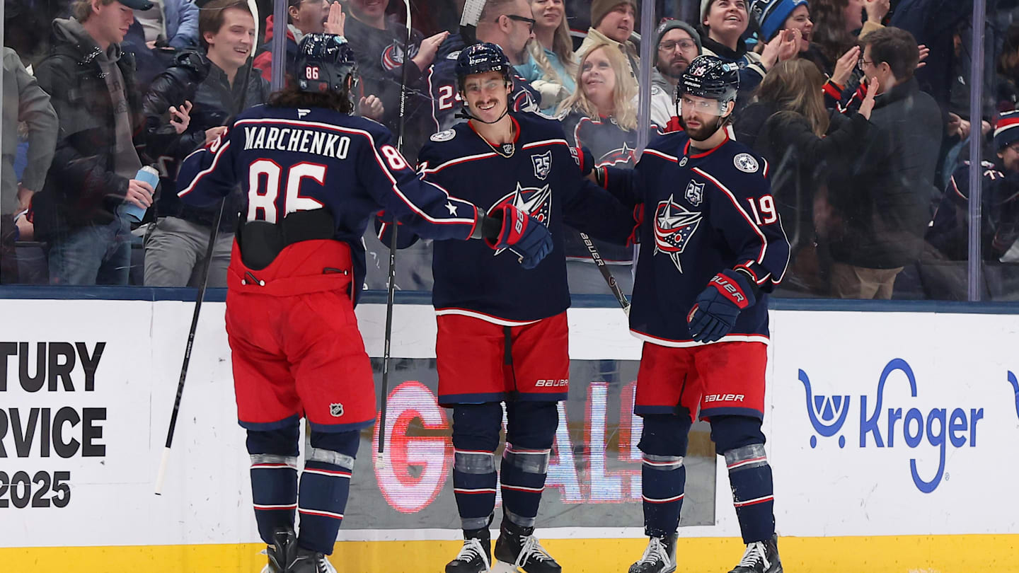 Jan 24, 2026; Columbus, Ohio, USA;  Columbus Blue Jackets left wing Mason Marchment (17) celebrates his third goal of the game with right wing Kirill Marchenko (86) and center Adam Fantilli (19) during the third period against the Tampa Bay Lightning at Nationwide Arena. Mandatory Credit: Joseph Maiorana-Imagn Images
