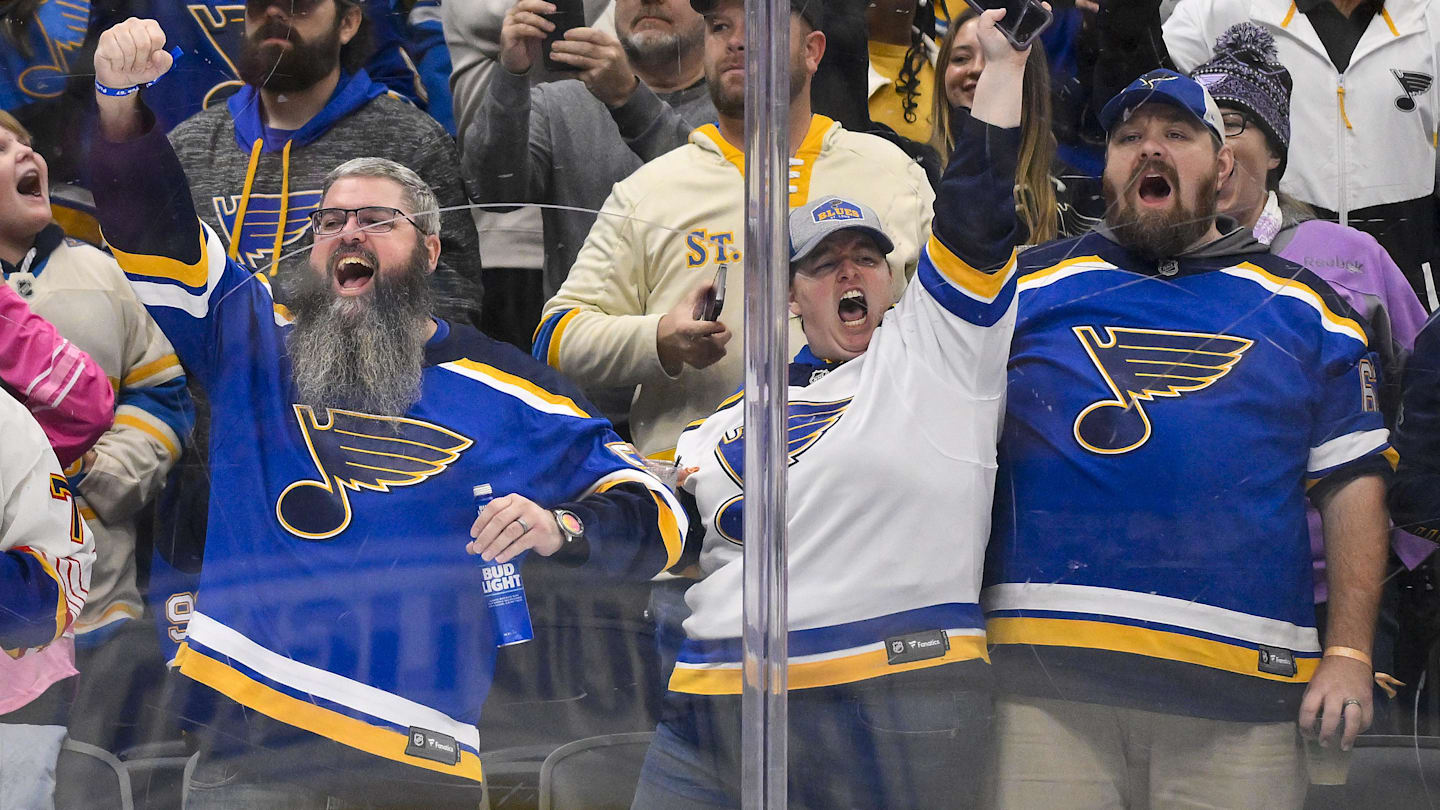 Oct 23, 2025; St. Louis, Missouri, USA; St. Louis Blues fans react after St. Louis Blues center Pius Suter (not pictured) scored against the Utah Mammoth during the second period at Enterprise Center. Mandatory Credit: Jeff Curry-Imagn Images