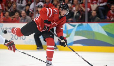 February 16, 2010; Vancouver, BC, CANADA; Canada forward Eric Staal (21) shoots the puck in the first period against Norway during the preliminary round of group A play of the 2010 Vancouver Olympics at the Canada Hockey Place. Mandatory Credit: Kyle Terada-Imagn Images