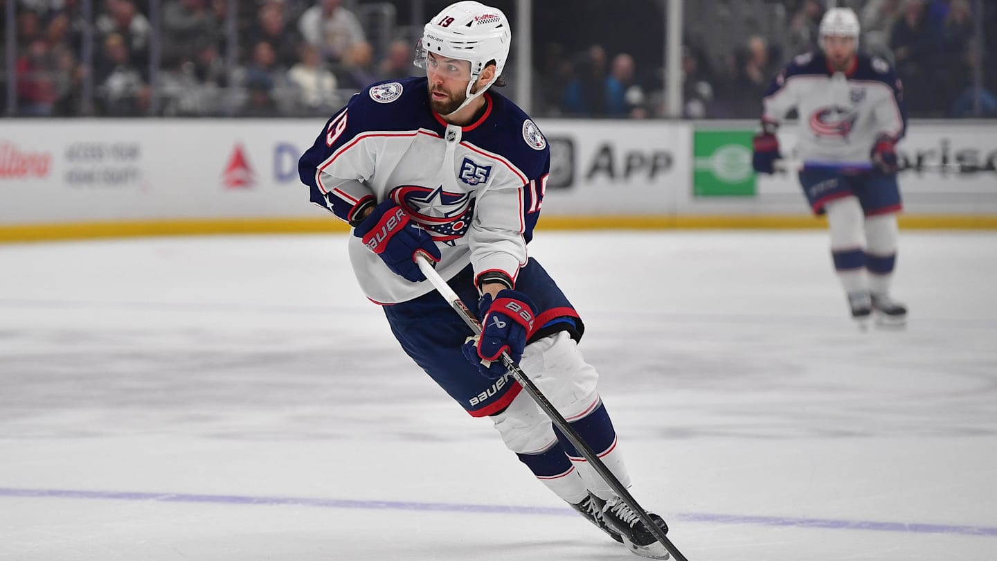 Dec 22, 2025; Los Angeles, California, USA; Columbus Blue Jackets center Adam Fantilli (19) controls the puck against the Los Angeles Kings during the first period at Crypto.com Arena. Mandatory Credit: Gary A. Vasquez-Imagn Images