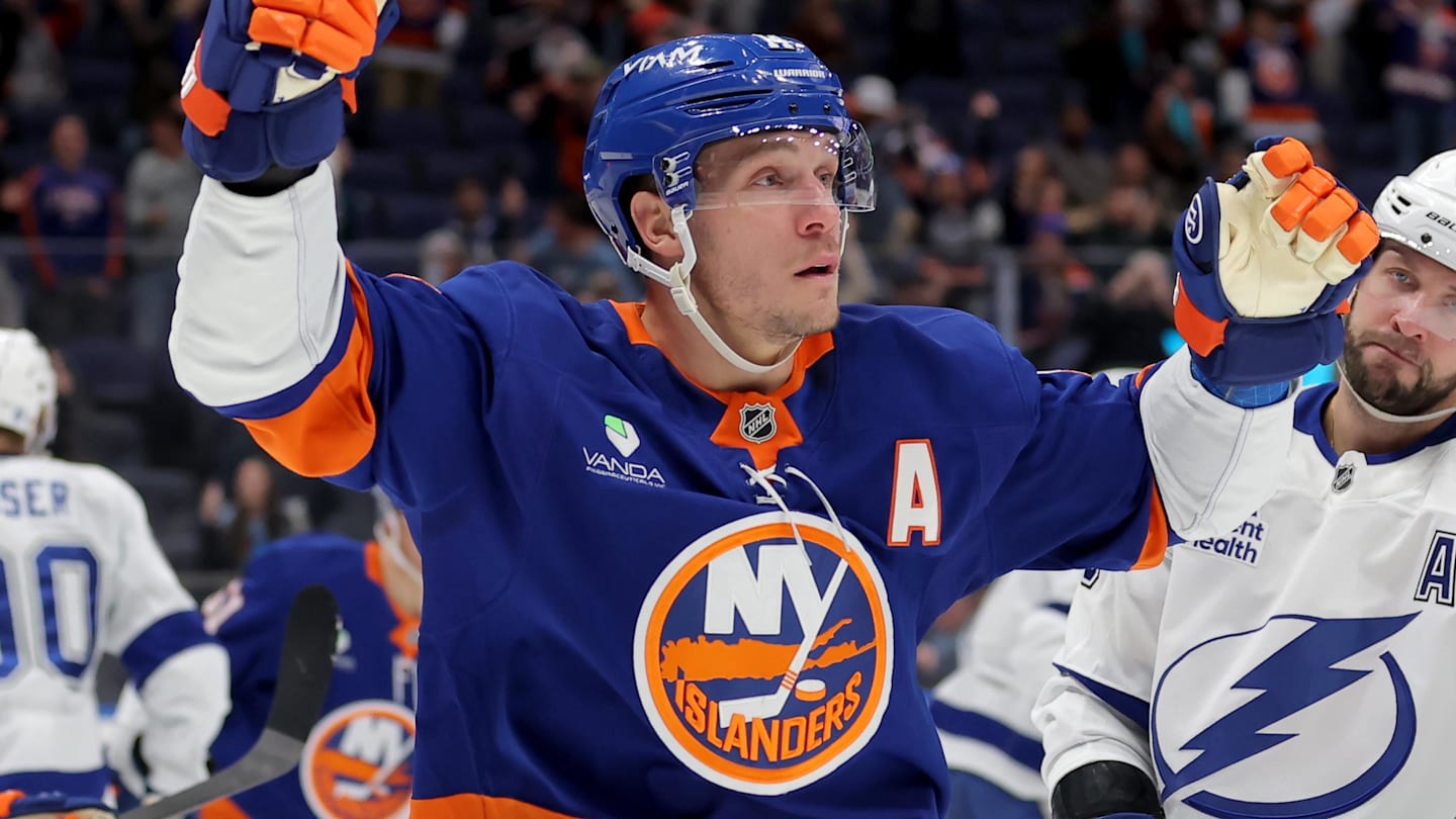 Dec 2, 2025; Elmont, New York, USA; New York Islanders center Bo Horvat (14) celebrates his goal against the Tampa Bay Lightning during the second period at UBS Arena. Mandatory Credit: Brad Penner-Imagn Images