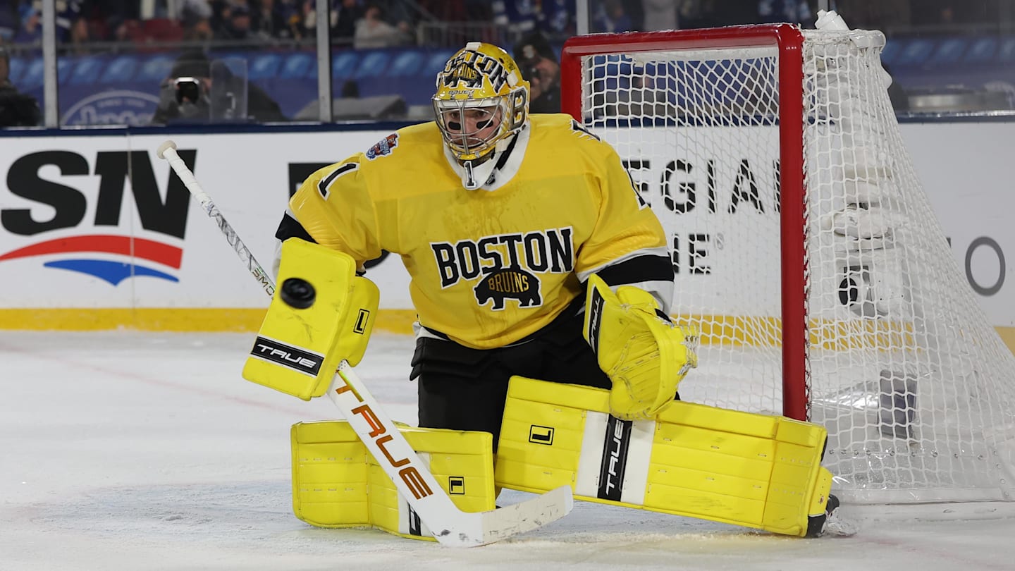 Feb 1, 2026; Tampa Bay, Florida, USA; Boston Bruins goaltender Jeremy Swayman (1) prepares to make the save against the Tampa Bay Lightning during overtime in the 2026 Stadium Series ice hockey game at Raymond James Stadium. Mandatory Credit: Kim Klement Neitzel-Imagn Images
