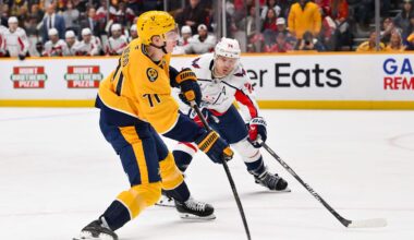 Jan 11, 2026; Nashville, Tennessee, USA;  Nashville Predators right wing Matthew Wood (71) takes a shot on goal against the Washington Capitals during the third period at Bridgestone Arena. Mandatory Credit: Steve Roberts-Imagn Images