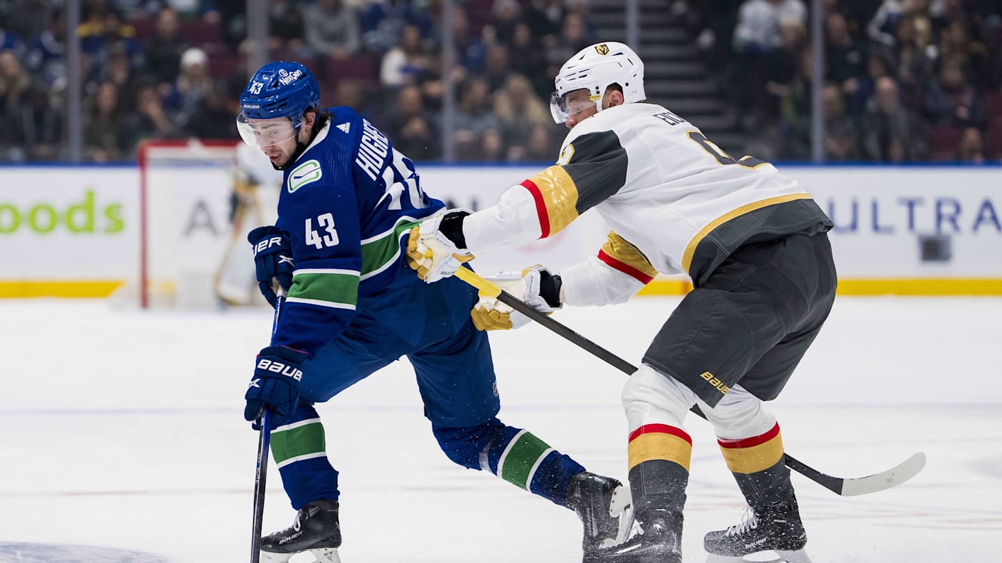 Nov 30, 2023; Vancouver, British Columbia, CAN; Vegas Golden Knights forward Jack Eichel (9) checks Vancouver Canucks defenseman Quinn Hughes (43) in the first period at Rogers Arena. Mandatory Credit: Bob Frid-Imagn Images