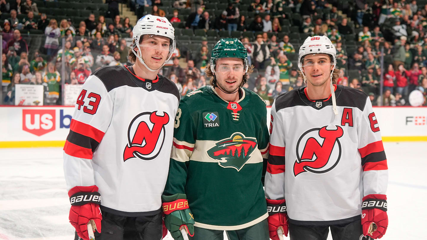 Vancouver Canucks defenseman Quinn Hughes (43) and New Jersey Devils center Jack Hughes (86): Ed Mulholland-Imagn Images