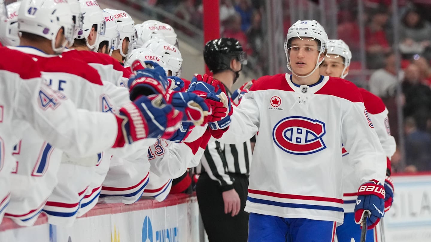 Jan 1, 2026; Raleigh, North Carolina, USA;  Montréal Canadiens center Oliver Kapanen (91) celebrates his goal against the Carolina Hurricanes during the first period at Lenovo Center. Mandatory Credit: James Guillory-Imagn Images