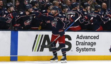 Blue Jackets captain Boone Jenner celebrates a goal with his teammates.