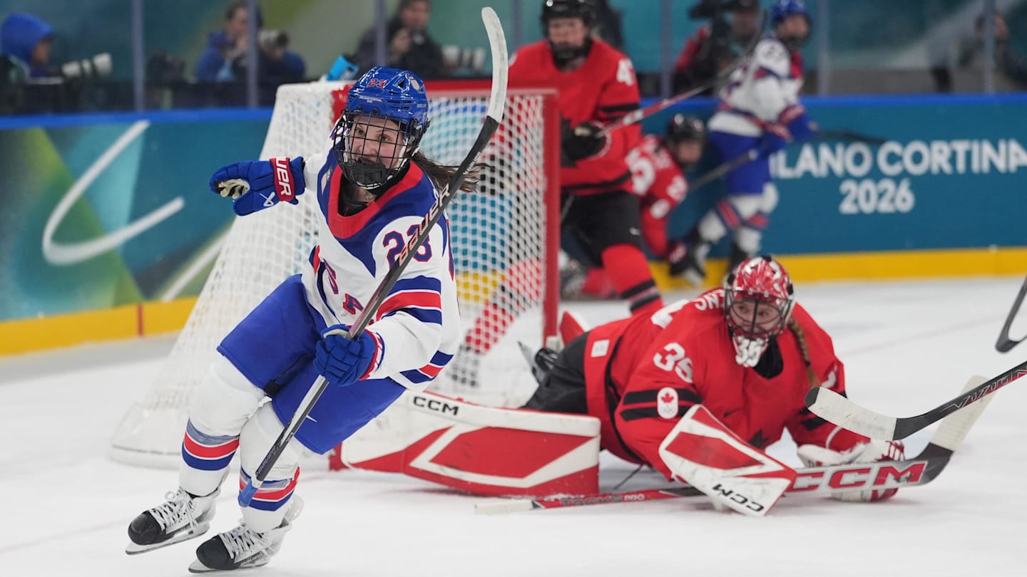 Feb 10, 2026; Milan, Italy; Hannah Bilka (23) of the United States scores a goal past Ann-Renee Desbiens (35) of Canada in women's ice hockey group A play during the Milano Cortina 2026 Olympic Winter Games at Milano Santagiulia Ice Hockey Arena. Mandatory Credit: Amber Searls-Imagn Images