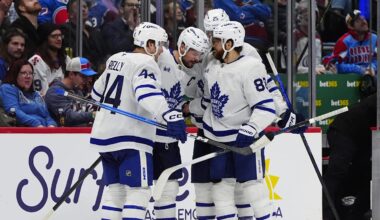 Jan 12, 2026; Denver, Colorado, USA; Toronto Maple Leafs center Auston Matthews (34) celebrates his goal with defenseman Morgan Rielly (44),right wing William Nylander (88), and defenseman Brandon Carlo (25) in the third period against the Colorado Avalanche at Ball Arena. Mandatory Credit: Ron Chenoy-Imagn Images