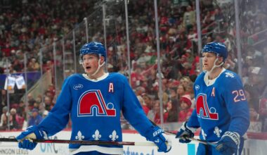 Jan 3, 2026; Raleigh, North Carolina, USA; Colorado Avalanche defenseman Cale Makar (8) and center Nathan MacKinnon (29) look on during the third period against the Carolina Hurricanes at Lenovo Center. Mandatory Credit: James Guillory-Imagn Images