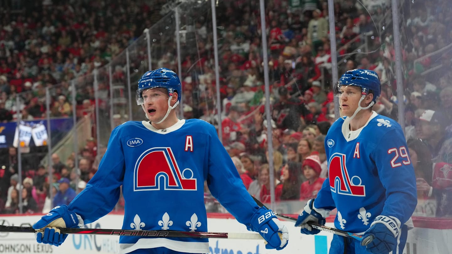 Jan 3, 2026; Raleigh, North Carolina, USA; Colorado Avalanche defenseman Cale Makar (8) and center Nathan MacKinnon (29) look on during the third period against the Carolina Hurricanes at Lenovo Center. Mandatory Credit: James Guillory-Imagn Images
