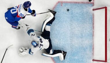 [US, Mexico & Canada customers only] Feb 11, 2026; Milan, Italy; Juraj Slafkovsky of Slovakia scores their first goal past Juuse Saros of Finland in men's ice hockey group B play during the Milano Cortina 2026 Olympic Winter Games at Milano Santagiulia Ice Hockey Arena. Mandatory Credit: Mike Segar/Reuters via Imagn Images