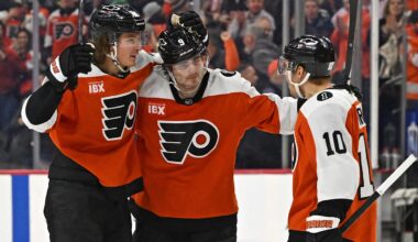 Feb 3, 2026; Philadelphia, Pennsylvania, USA; Philadelphia Flyers defenseman Jamie Drysdale (9) celebrates his goal with center Trevor Zegras (46) and right wing Bobby Brink (10) against the Washington Capitals during the third period at Xfinity Mobile Arena.