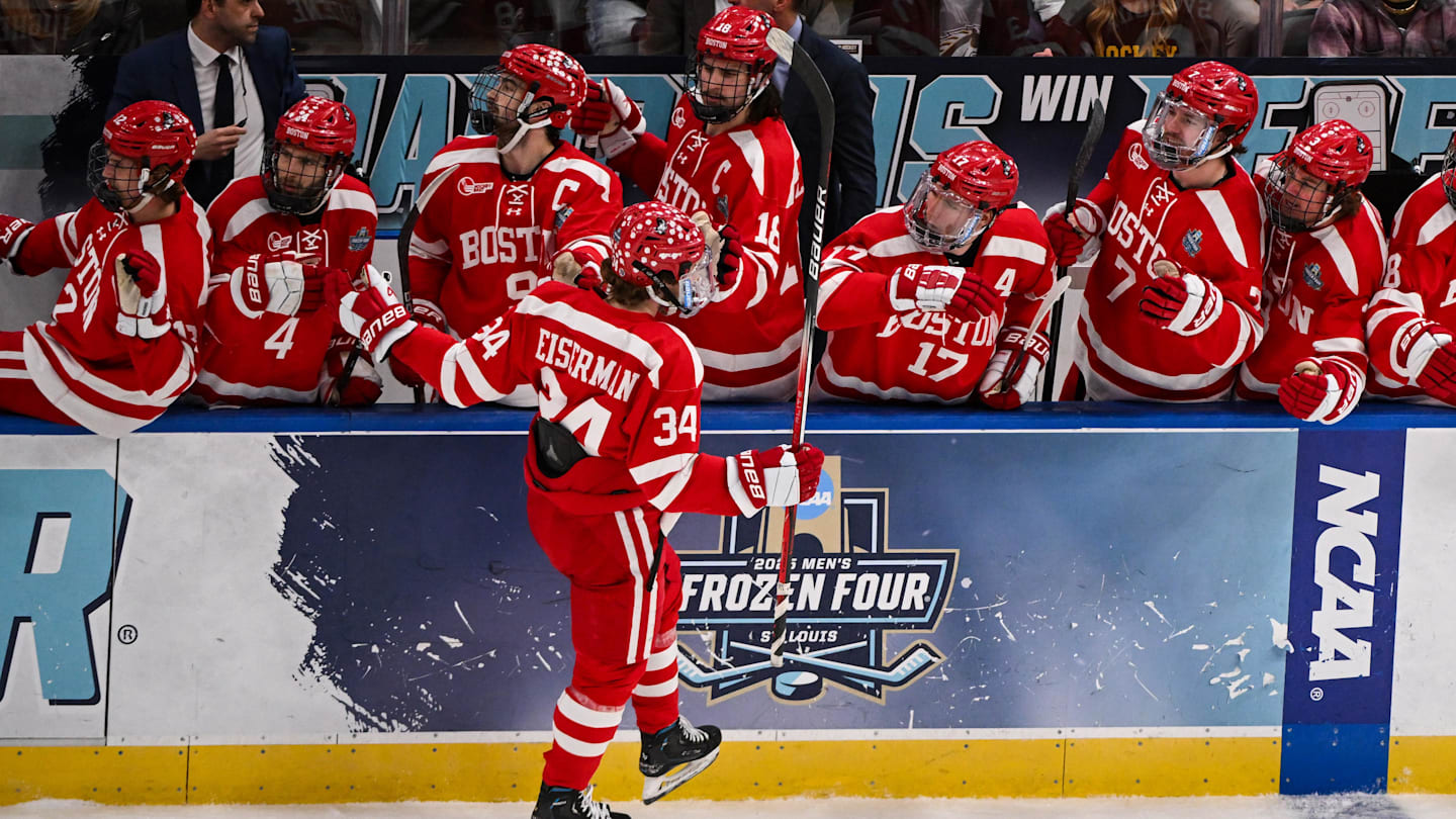 Apr 12, 2025; St. Louis, Missouri, UNITED STATES; Boston University Terriers forward Cole Eiserman (34) celebrates with teammates after scoring a goal against the Western Michigan Broncos during the first period of the Frozen Four college ice hockey national championship at Enterprise Center. Mandatory Credit: Connor Hamilton-Imagn Images