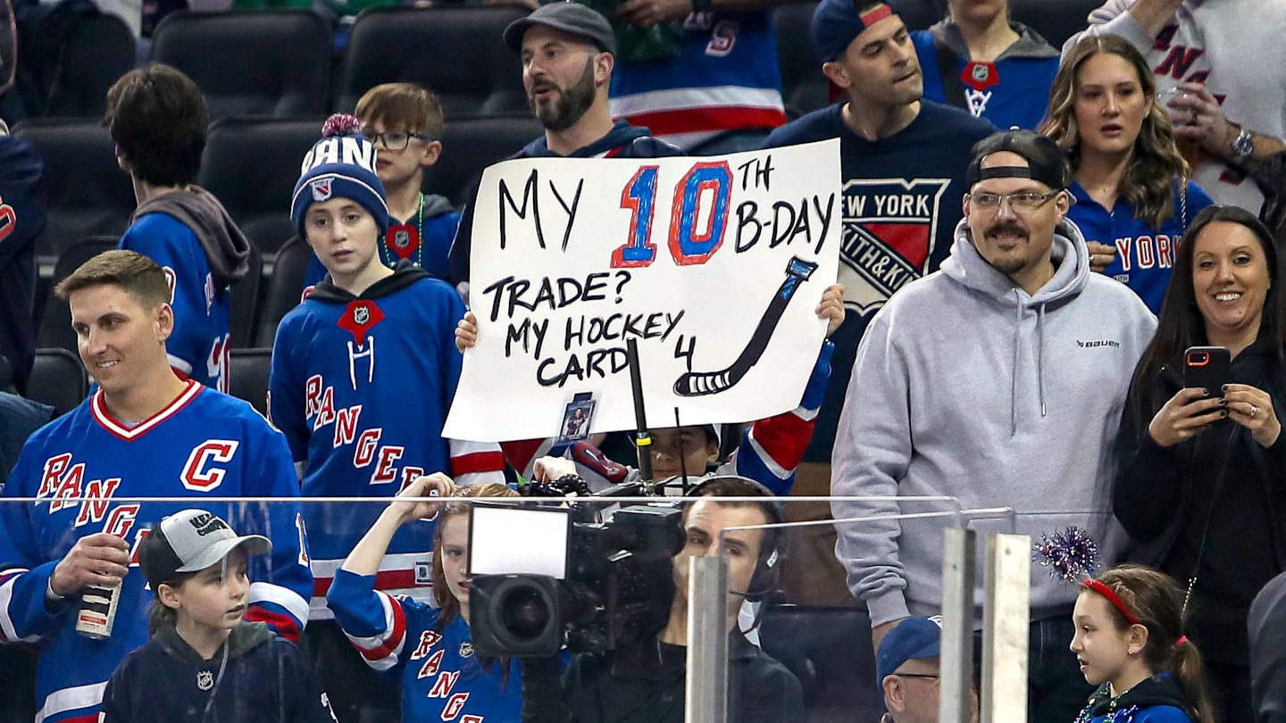 Mar 16, 2025; New York, New York, USA; New York Rangers fans hold a sign during the first period against the Edmonton Oilers at Madison Square Garden. Mandatory Credit: Danny Wild-Imagn Images
