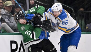 Jan 23, 2026; Dallas, Texas, USA; St. Louis Blues defenseman Colton Parayko (55) checks Dallas Stars left wing Jason Robertson (21) during the first period at the American Airlines Center. Mandatory Credit: Jerome Miron-Imagn Images