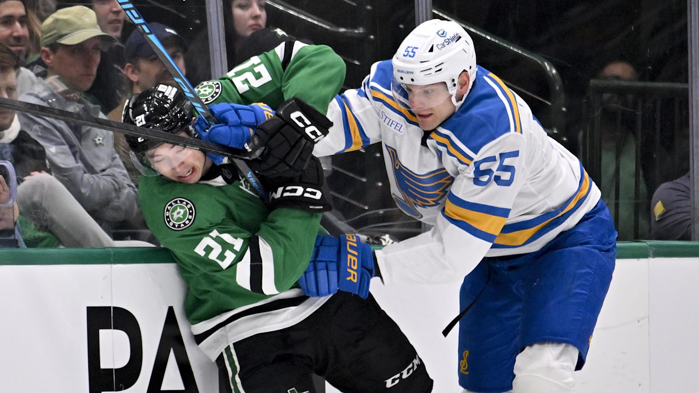 Jan 23, 2026; Dallas, Texas, USA; St. Louis Blues defenseman Colton Parayko (55) checks Dallas Stars left wing Jason Robertson (21) during the first period at the American Airlines Center. Mandatory Credit: Jerome Miron-Imagn Images