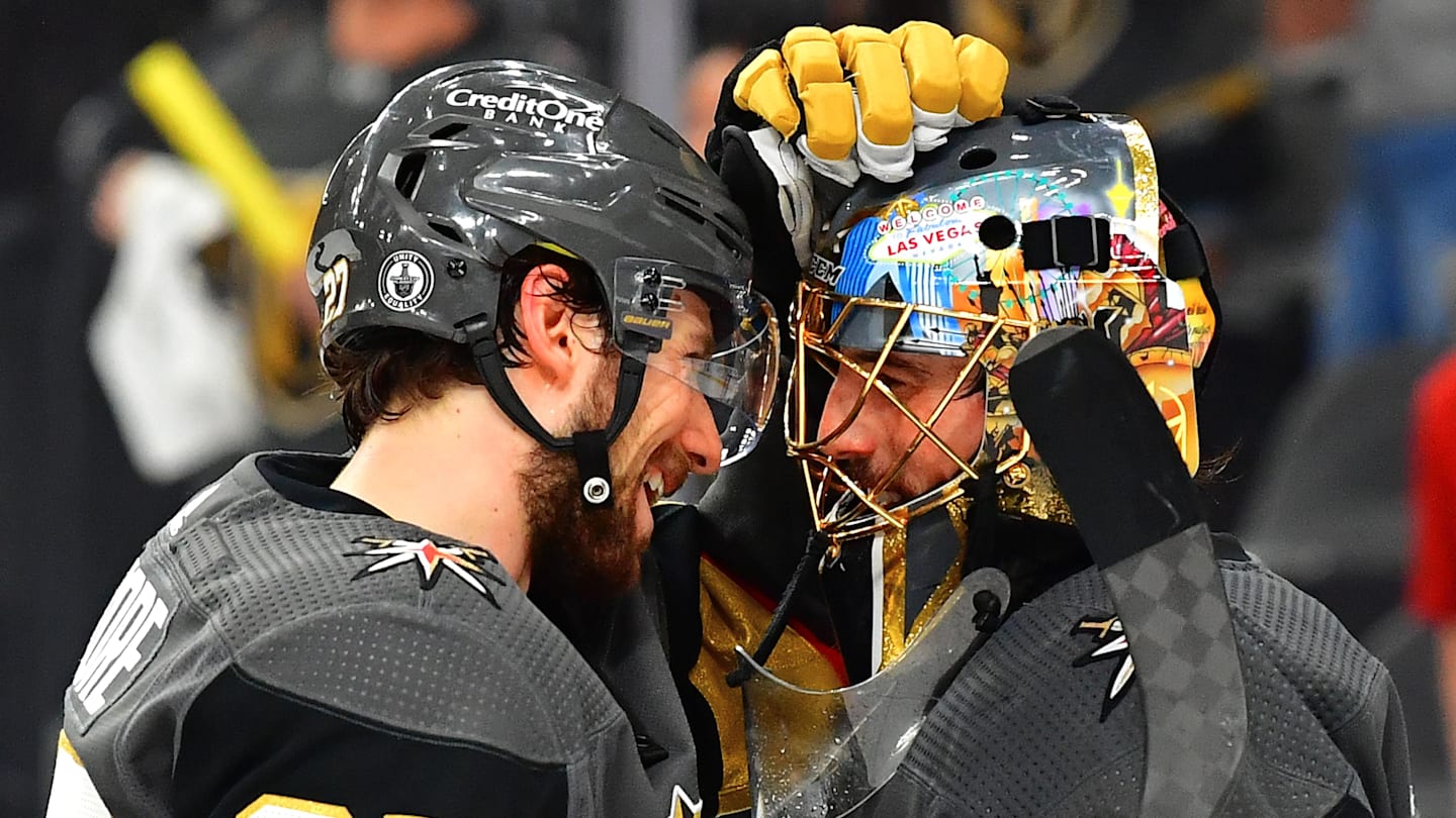 Jun 14, 2021; Las Vegas, Nevada, USA; Vegas Golden Knights defenseman Shea Theodore (27) congratulates Vegas Golden Knights goaltender Marc-Andre Fleury (29) after the Golden Knights defeated the Montreal Canadiens 4-1 in game one of the 2021 Stanley Cup Semifinals at T-Mobile Arena. Mandatory Credit: Stephen R. Sylvanie-Imagn Images