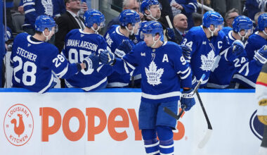 Jan 23, 2026; Toronto, Ontario, CAN; Toronto Maple Leafs center John Tavares (91) celebrates at the bench after scoring a goal against the Vegas Golden Knights during the second period at Scotiabank Arena. Mandatory Credit: Nick Turchiaro-Imagn Images