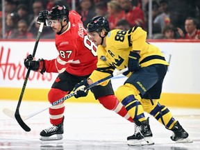 William Nylander of Team Sweden checks Sidney Crosby of Team Canada during the 4 Nations Face-Off last year.