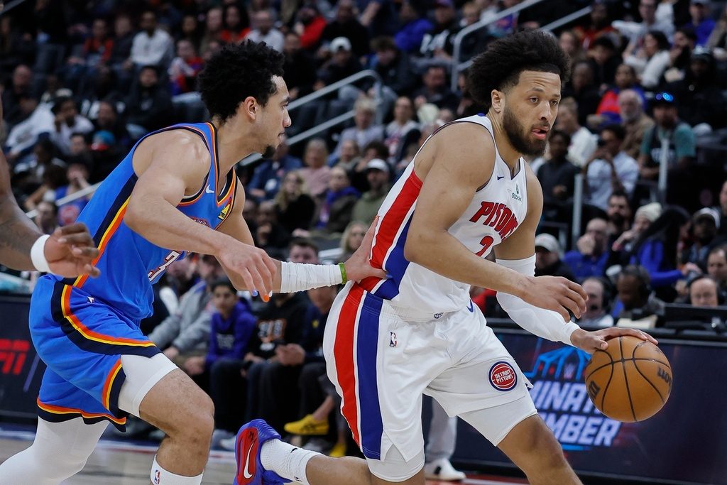 Pistons beat defending champs 124-116