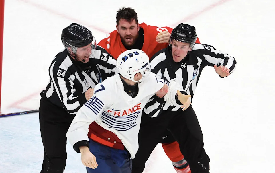 Pierre Crinon #7 of Team France figth with Tom Wilson #43 of Team Canada during the Ice Hockey