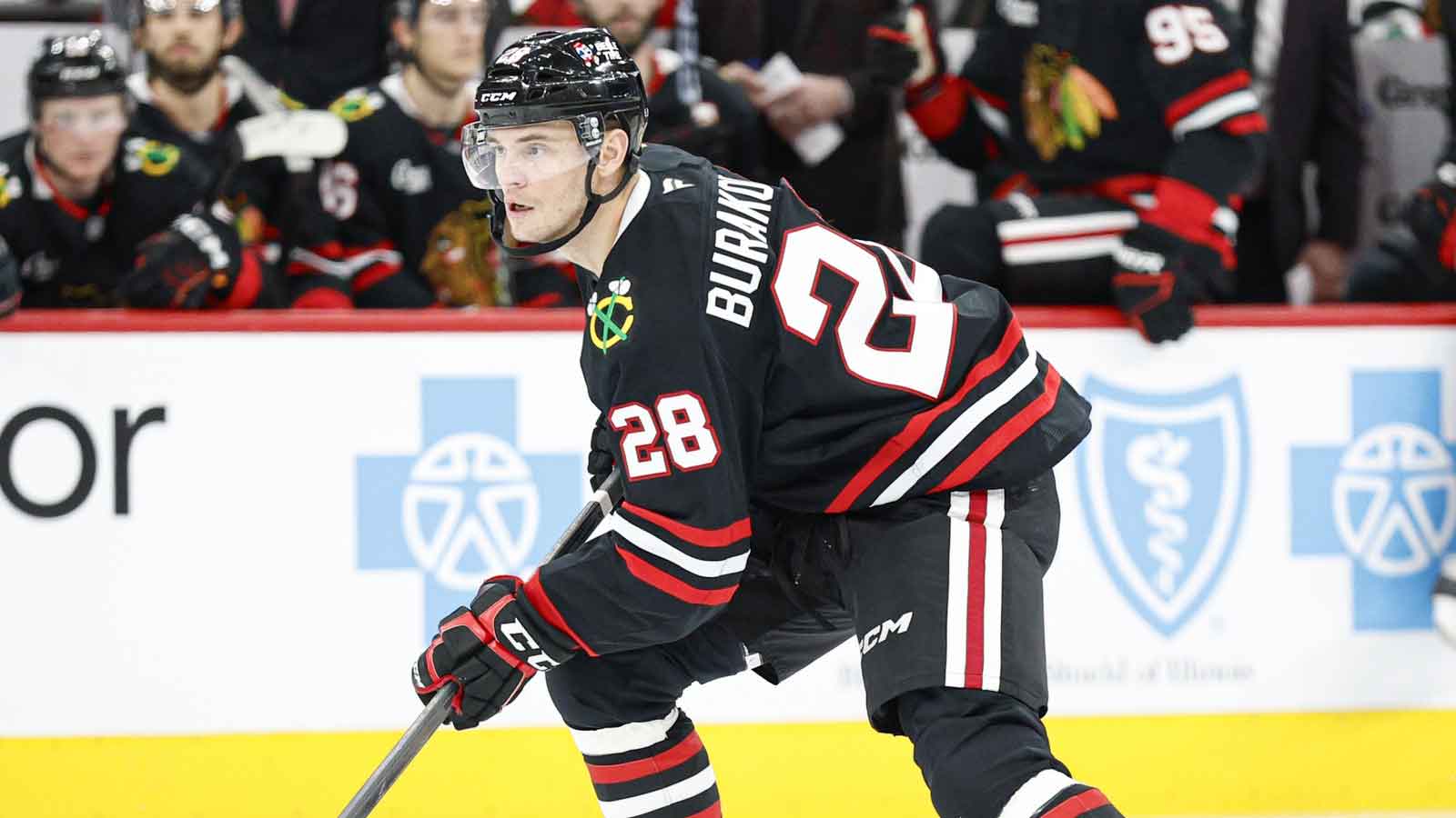 Chicago Blackhawks left wing Andre Burakovsky (28) looks to pass the puck against the Tampa Bay Lightning during the first period at United Center.