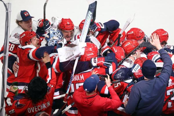 NHL roundup: Down 3-0, Caps storm past rival Canes in OT