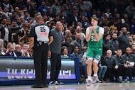 Dallas Mavericks forward Cooper Flagg (32) reacts towards the referee after a foul call...