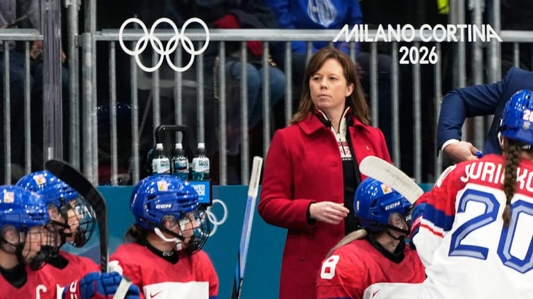 Czechia's Head Coach Carla Rae MacLeod is at the bench...