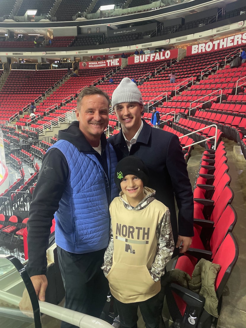A photo of Dallas Stars' goaltender Jake Oettinger with his father Chris Oettinger and...