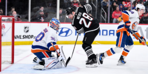Timo Meier looks for a rebound in front of Ilya Sorokin in the second period of Thursday's Devils versus Islanders game.
