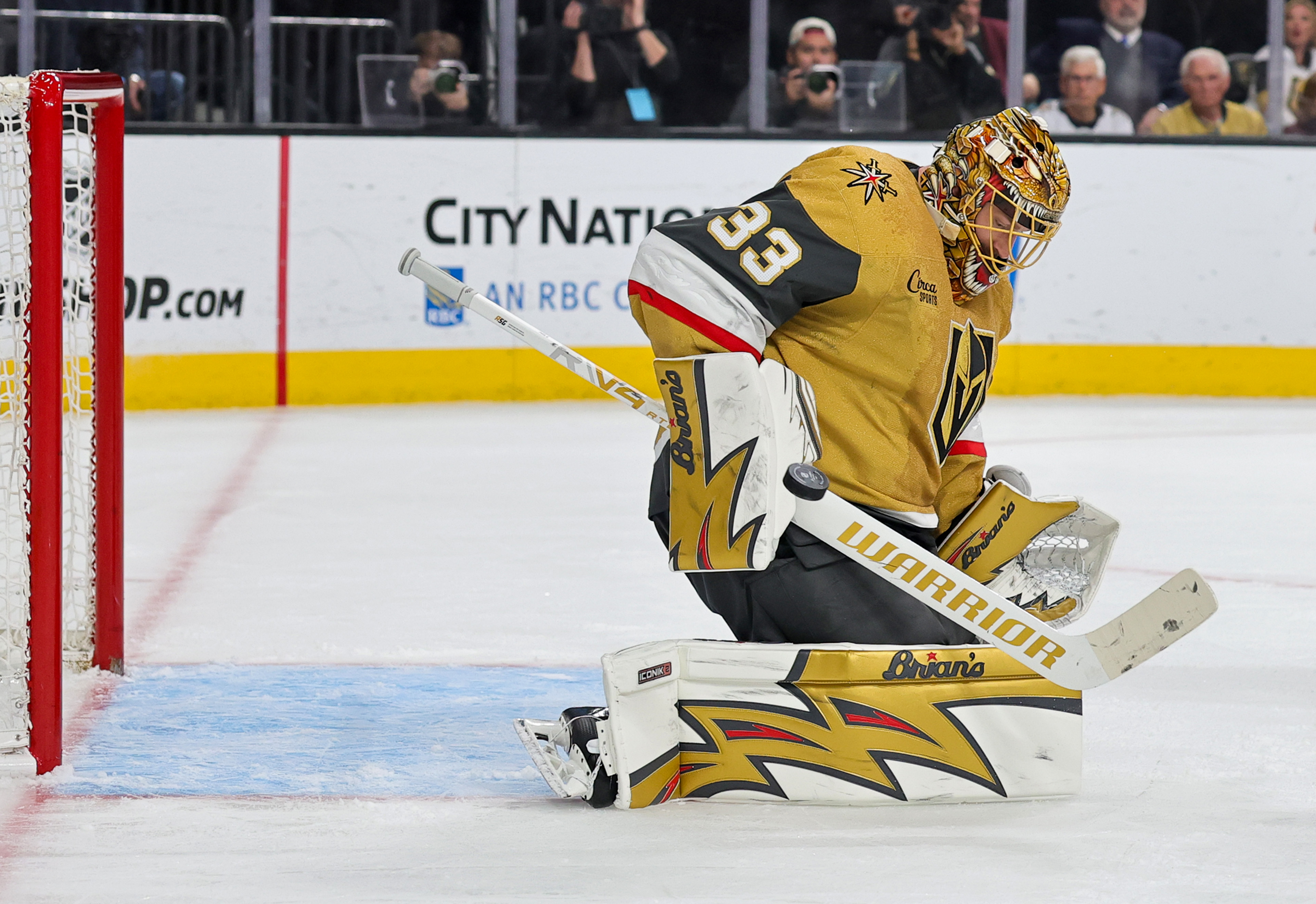 Vegas Golden Knights goaltender Adin Hill deflects a shot during...
