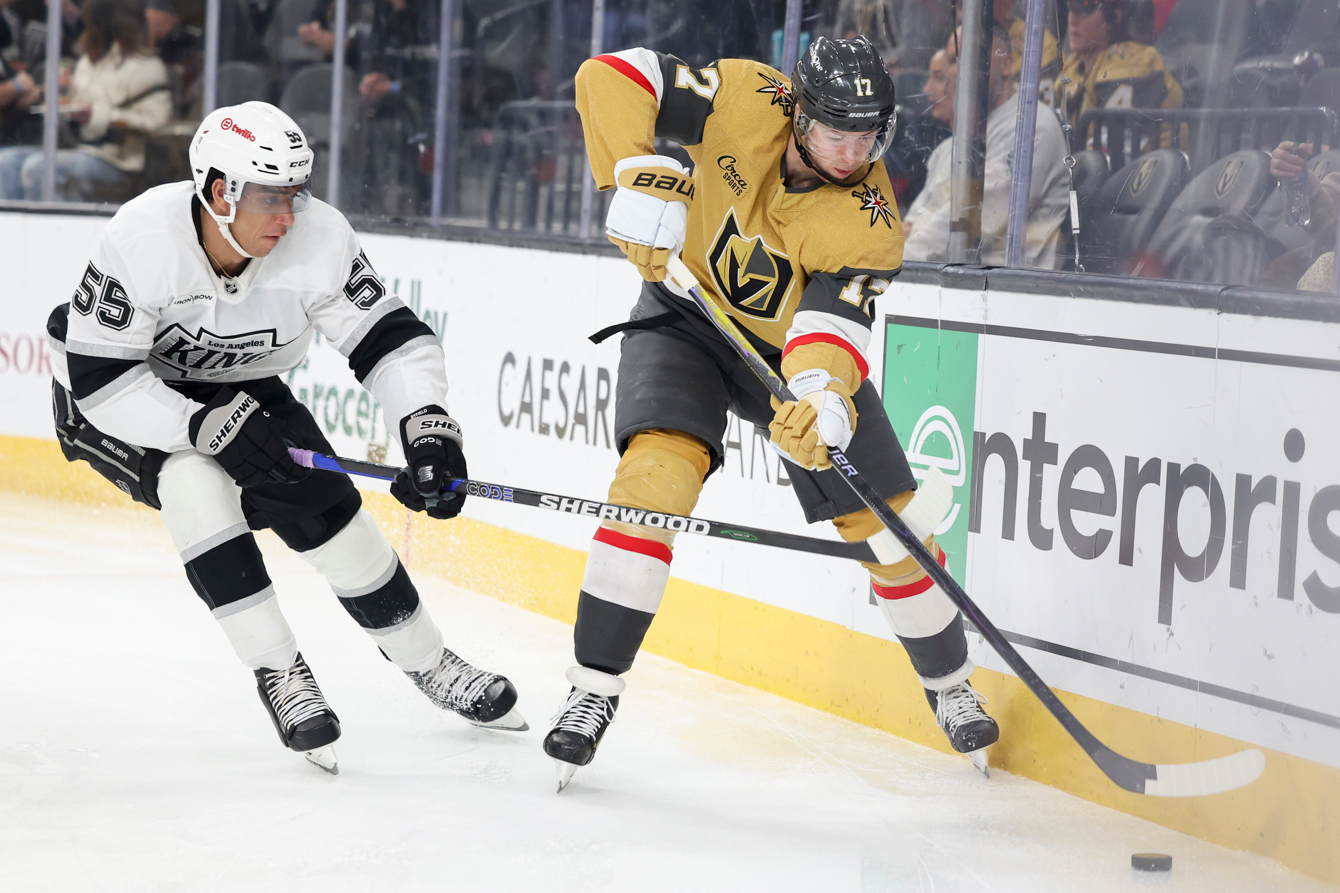 Vegas Golden Knights defenseman Ben Hutton, right, skates against Kings...