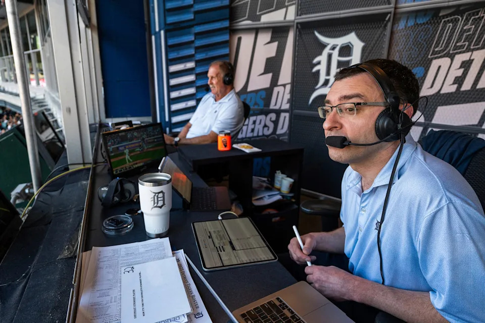 Detroit Tigers TV announcers Jason Benetti and Dan Petry call a game against the Houston Astros at Comerica Park in Detroit on Monday, Aug. 18, 2025.
