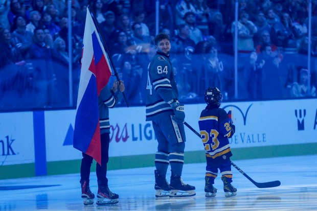San Jose Sharks Pavol Regenda (84) smiles after being honored for being on the Slovakia roster for the 2026 Olympic Winter Games in Milan before a game against the New York Rangers at the SAP Center in San Jose, Calif., on Friday, Jan. 23, 2026. (Shae Hammond/Bay Area News Group)