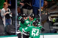 Dallas Stars right wing Mikko Rantanen (96) celebrates his goal with center Roope Hintz (24)...