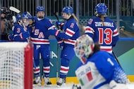 Team United States players celebrate a goal by Kendall Coyne, second from left, during the...