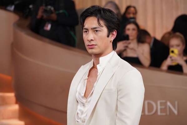 Hudson Williams arrives at the 83rd Golden Globes, Jan. 11, 2026, at the Beverly Hilton in Beverly Hills, Calif. (Photo by Jordan Strauss/Invision/AP, File)