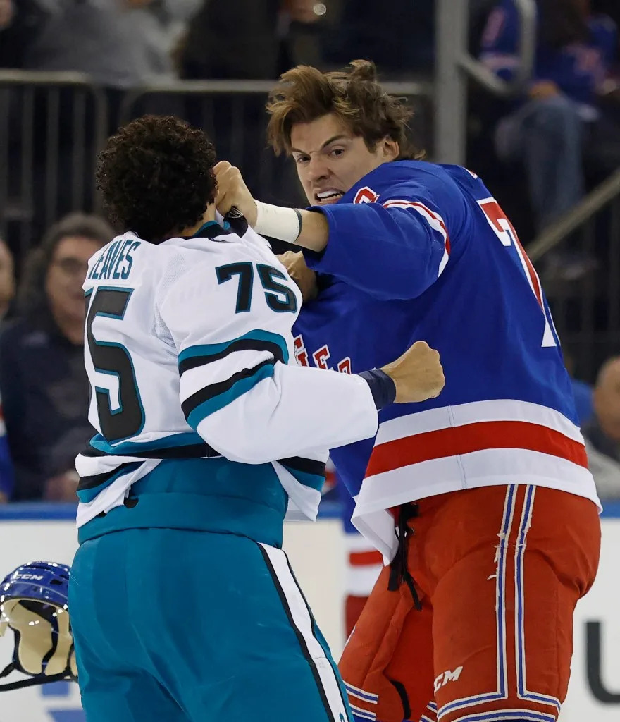 New York Rangers center Matt Rempe and San Jose Sharks right wing Ryan Reaves get into a scuffle in the first period at Madison Square Garden in New York, October 23, 2025. JASON SZENES/ NY POST